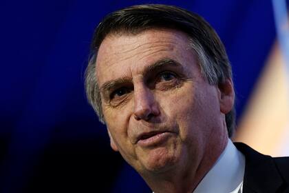 Jair Bolsonaro evitó condenar a Vladimir Putin, negó una masacre y dijo que Brasil tiene “muchos negocios con Rusia” (REUTERS/Adriano Machado)
