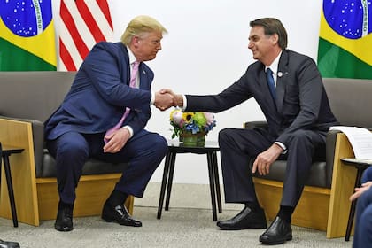 Jair Bolsonaro junto a Donald Trump en el Cumbre del G20