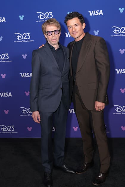 Jerry Bruckheimer junto a Orlando Bloom