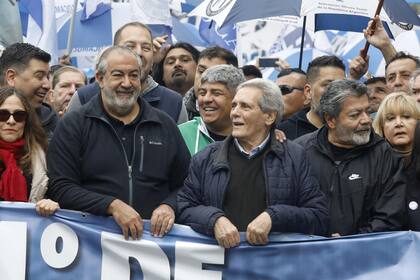 El triunvirato de mando, al frente de la marcha de la CGT: Héctor Daer, Pablo Moyano y Carlos Acuña