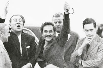 Juan Manuel Abal Medina (padre), a la derecha.