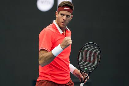 Juan Martin Del Potro of Argentina celebrates winning the match during his mens singles quarter finals match against Filip Krajinovic of Serbia at the China Open tennis tournament in Beijing on October 5, 2018. (Photo by NICOLAS ASFOURI / AFP)