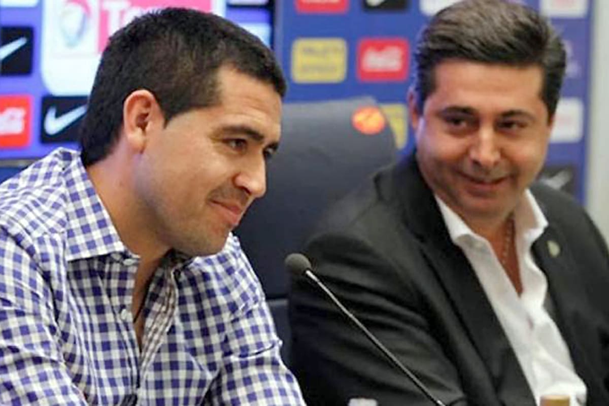 Juan Roman Riquelme y Daniel Angelici .