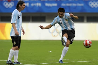 Juan Román Riquelme y Lionel Messi