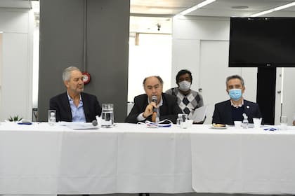 Julio Alak, Mario Cafiero y Andrés Larroque