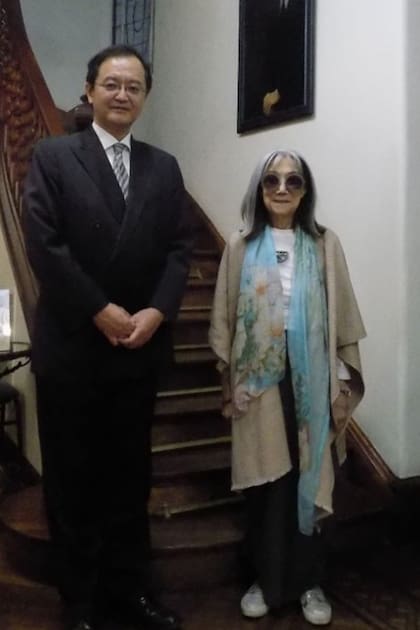 Junto a María Kodama