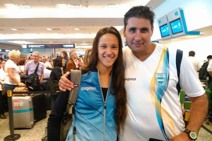 Junto a su entrenador, Federico Rossi
