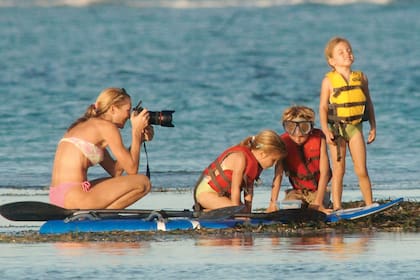 Junto a tres de sus hijos durante las vacaciones familiares en Punta Cana, en enero de 2006.