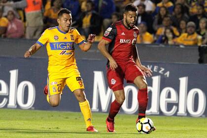 Justín Morrow (derecha), defensor de Toronto FC, fue nombrado director ejecutivo de la coalición.
