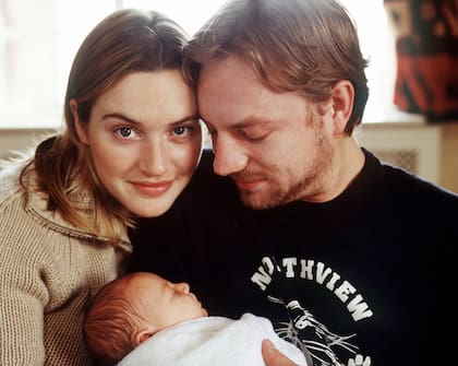 Kate Winslet junto a Jim Threapleton y la pequeña Mia