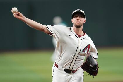Kelly poncha a 11 y Diamondbacks superan 1-0 a Rockies para ganar la serie