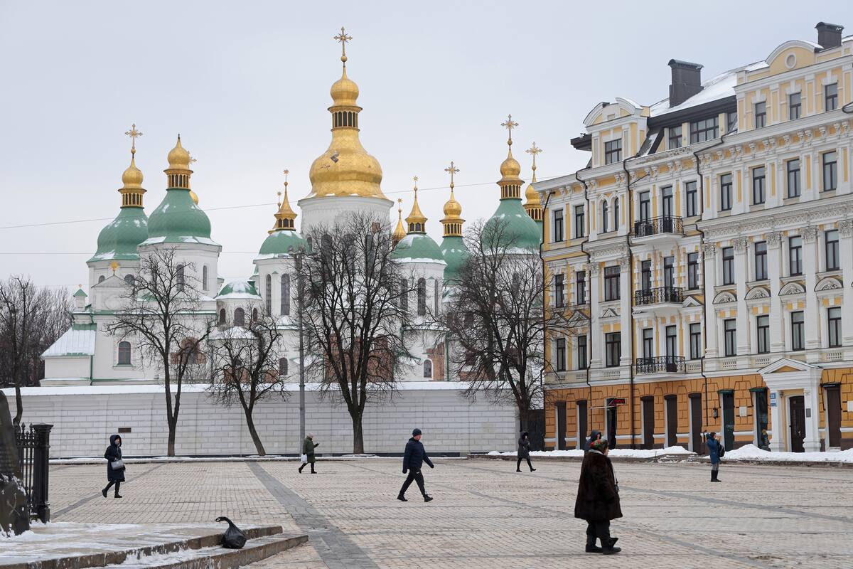 KYIV, UKRAINE - JANUARY 25: People walk past Saint Sophia Cathedral at Sophia Square on January 25, 2022 in Kyiv, Ukraine. International fears of an imminent Russian military invasion of Ukraine remain high as Russian troops mass along the Russian-Ukrainian border. (Photo by Sean Gallup/Getty Images)