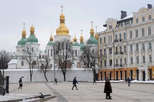 KYIV, UKRAINE - JANUARY 25: People walk past Saint Sophia Cathedral at Sophia Square on January 25, 2022 in Kyiv, Ukraine. International fears of an imminent Russian military invasion of Ukraine remain high as Russian troops mass along the Russian-Ukrainian border. (Photo by Sean Gallup/Getty Images)