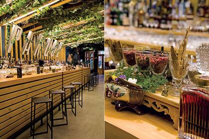 La barra, protagonista absoluta, es de madera clara. La acompañan banquetas de hierro