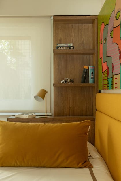 La biblioteca es un diseño del Estudio. Ropa de cama (Angelina Linen).