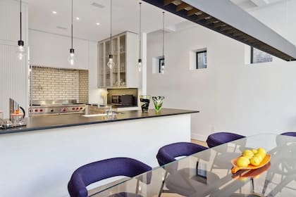 La cocina con espacio para comedor