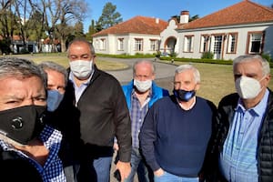 La cúpula de la CGT en una de sus últimas visitas a la residencia oficial de Olivos; descartan una reducción de la jornada laboral