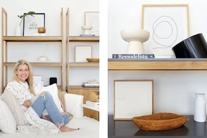 La diseñadora Roxana Lotesrztain, junto a la biblioteca (La Charrúa) con piezas cerámicas (Blau), contenedor negro ‘Sfera’ (Derlot), libro de la revista Remodelista (Le Book Marque), cuadro de Carla Freschi y cuenco de madera (Sol Palou).