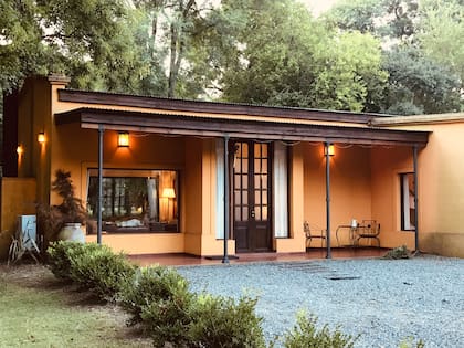 Esta casa divina es un refugio para los amantes del río y la vida campestre.