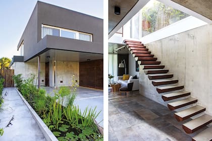 La escalera en voladizo se construyó con listones de acero Corten empotrados en el muro de hormigón.