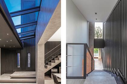 La escalera se revistió con el mismo microcemento (Duro Pisos) que el exterior de la casa para vincular el adentro con el afuera. Las barandas fueron diseñadas por OMH Arquitectos con tubos de chapa plegada y tensores metálicos (Tensocable).
