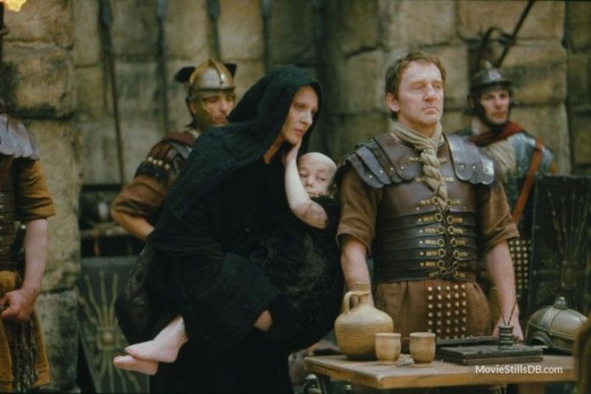 La escena del demonio y el bebé