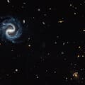 La NASA fotografió dos galaxias a 4500 y 8000 millones de años luz
