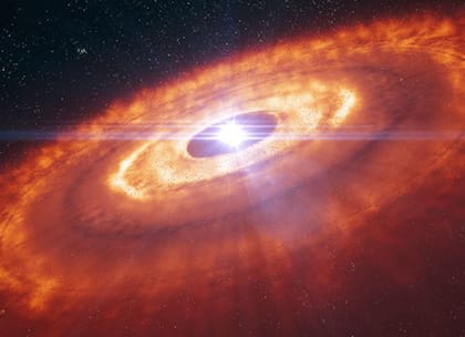 La impresión de este artista muestra una estrella joven rodeada por un disco protoplanetario, donde los granos de polvo se juntan para formar planetesimales, los componentes básicos de nuevos planetas