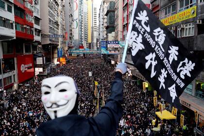 La manifestación a favor de la democracia, organizada por el Frente Civil de los Derechos Humanos, en Hong Kong