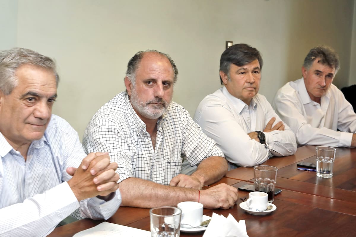 La Mesa de Enlace. Carlos Iannizzotto (Coninagro), Jorge Chemes (CRA), Daniel Pelegrina (SRA) y Carlos Achetoni (FAA)