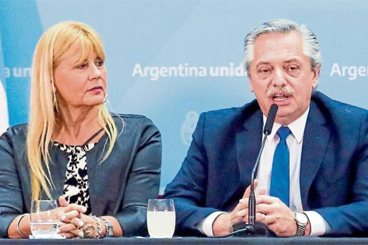 La ministra de Justicia, Marcela Losardo, una de las autoras de la reforma, y el Presidente