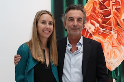La anfitriona, María Calcaterra, y su padre, Ángelo Calcaterra, primo de Mauricio Macri