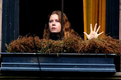 La mujer en la ventana