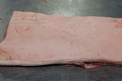 La panceta del lado del cuero