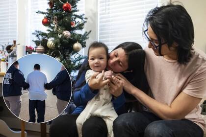 La pareja con su hijo de siete meses en brazos