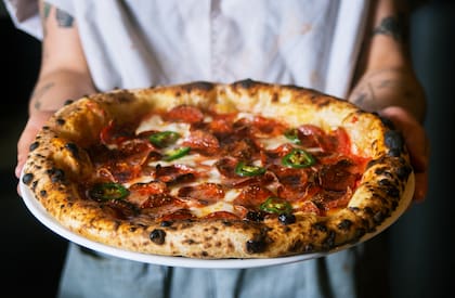 La pizza de queso es la base para todas las otras variantes; cada 5 de septiembre en Estados Unidos se conmemora su día