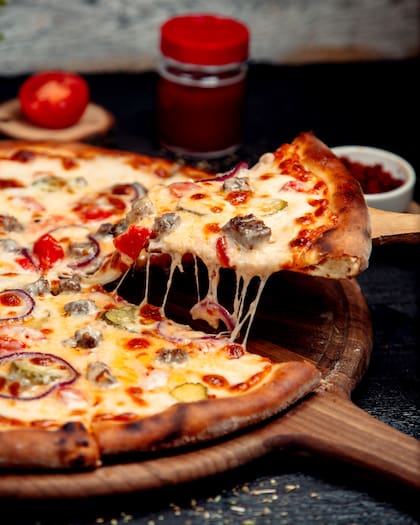 La pizza es uno de los alimentos más consumidos en el mundo (Foto de carácter ilustrativo: Freepik)