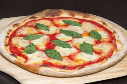 La pizza Margarita lleva los colores de la bandera de Italia.