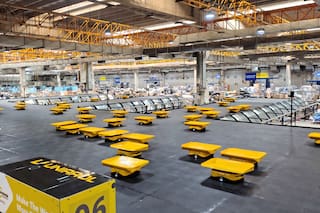 El Correo Argentino inauguró un centro que usa 240 robots para clasificar paquetes