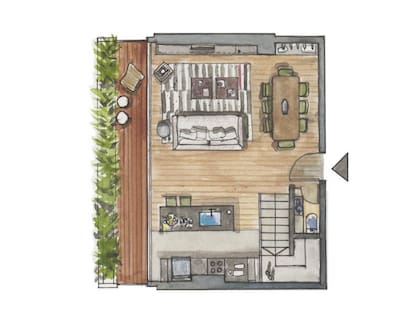 La planta mide 8x7m, contando el balcón. La flecha señala la puerta de entrada. En este piso, la intervención más importante fue crear un mueble de pared a pared en madera y acero que ocultara el tablero eléctrico y una mocheta. En un solo frente continuo resuelve el rack de TV, el guardado de la vajilla, la biblioteca, la cava y un sector de bar.