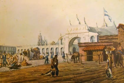La Plaza del Fuerte, actual costado este de la Plaza de Mayo, reproducido por Emeric Essex Vidal. En el sitio donde se ve el gran arco de la recova, hoy se encuentra la Pirámide de Mayo.