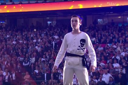La recreación de la presunta creación del rugby por William Webb Ellis, en la ceremonia inaugural de Inglaterra 2015
