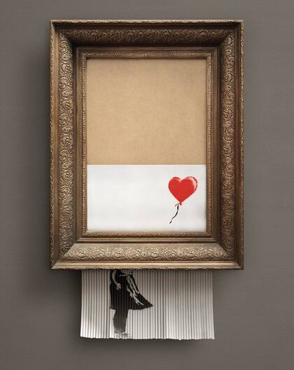 La reproducción de Niña con globo, del street art británico Bansky, se autodestruyó apenas fue vendida en Sothebys, el 6 de octubre último