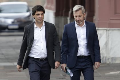 Lacunza y Frigerio, al salir, ayer, de Casa de Gobierno