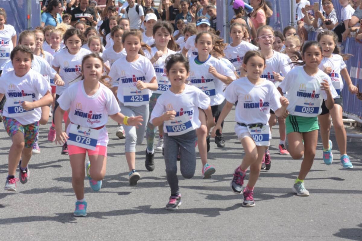 Largada de los chicos, junto al mar