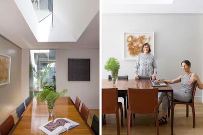 Las titulares de Estudio Planta en el flamante comedor, donde bajaron la altura del techo y rediseñaron una vieja lucarna con disposición horizontal y líneas finas y elegantes.