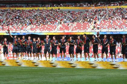Lavezzi en el podio dorado de Pekín 2008
