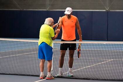 Leonid Stanislavskyi y Rafael Nadal, felices tras la experiencia