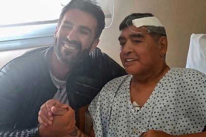 Leopoldo Luque, uno de los acusados, y Diego Maradona