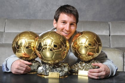 Lionel, con los tres Balones de Oro que tiene (por ahora)